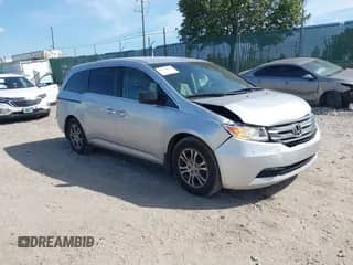 2012 Honda Odyssey EX z VIN 5FNRL5H49CB059301, wystawiony jako IAAI lot #43372796 z przebiegiem 131 739 mil mil oraz . Historia ofert i sprzedaży dostępna na DreamBid. Obrazek 1.