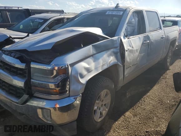 ✅ 2018 Chevrolet Silverado 1500 LT • VIN: 3GCUKREC3JG128829 • Лот: 67401364. Опубликован ранее на Copart с пробегом Не указан. Бесплатный доступ к архиву аукционных продаж из США и подробный отчёт об истории автомобиля на DreamBid. Изображение 1.