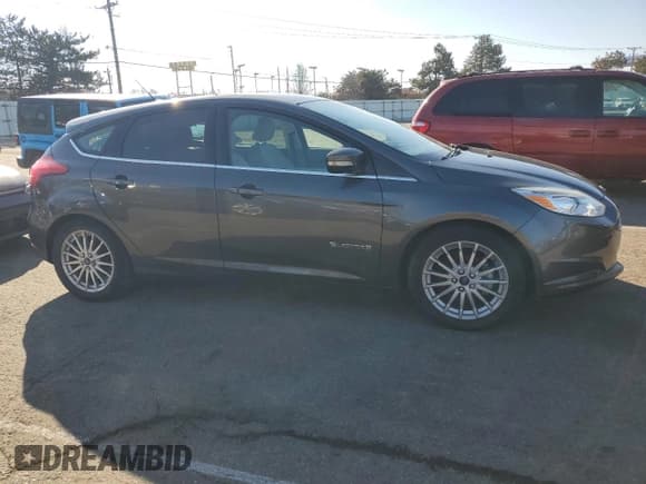 ✅ 2015 Ford Focus Electric • VIN: 1FADP3R49FL211344 • Lot: 40895604. Listed on Copart with 59,815 mi. Free auction sales archive from the USA and detailed vehicle history report at DreamBid. Image 4.