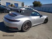 ✅ 2020 Porsche 911 Carrera S • VIN: WP0CB2A9XLS262651 • Лот: 76948374. Опубликован ранее на Copart с пробегом 25 800 миль. Бесплатный доступ к архиву аукционных продаж из США и подробный отчёт об истории автомобиля на DreamBid. Изображение 3.