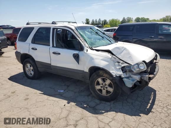 ✅ 2006 Ford Escape XLS • VIN: 1FMYU02Z06KC27247 • Lot: 56664685. Listed on Copart with 201,618 mi. Free auction sales archive from the USA and detailed vehicle history report at DreamBid. Image 4.