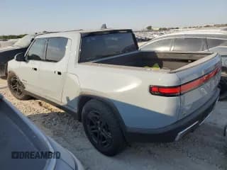 ✅ 2023 Rivian R1T Adventure • VIN: 7FCTGAAA9PN019207 • Lot: 74323054. Listed on Copart with 7,814 mi. Free auction sales archive from the USA and detailed vehicle history report at DreamBid. Image 2.