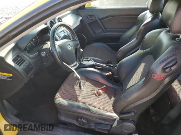 2006 Hyundai Tiburon GT с VIN KMHHN65F86U196206, выставлен на аукционе Copart как лот 83924625 с пробегом 137 605 миль миль и Списание • Salvage title. История ставок и продаж доступна на DreamBid. Изображение 7.