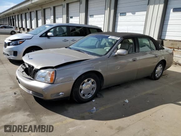 ✅ 2002 Cadillac DeVille • VIN: 1G6KD54Y32U207510 • Lot: 40418664. Listed on Copart with 77,565 mi. Free auction sales archive from the USA and detailed vehicle history report at DreamBid. Image 1.