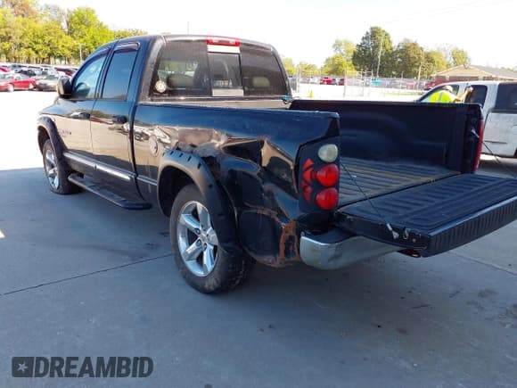 ✅ 2006 Dodge 1500 Laramie • VIN: 1D7HU18246S543714 • Lot: 43436054. Listed on IAAI with 193,497 mi. Free auction sales archive from the USA and detailed vehicle history report at DreamBid. Image 3.