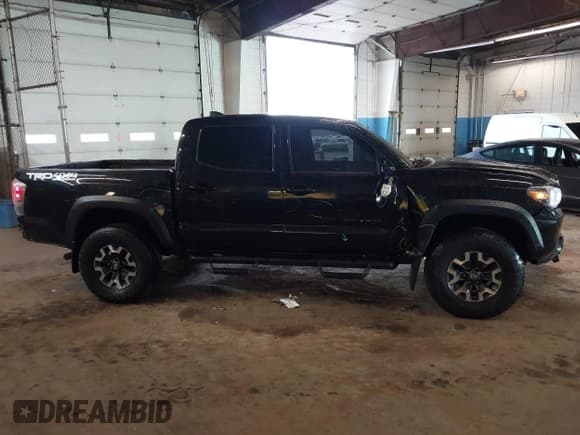 ✅ 2023 Toyota Tacoma SR • VIN: 3TMCZ5AN1PM583518 • Lot: 41842903. Listed on IAAI with 24,204 mi. Free auction sales archive from the USA and detailed vehicle history report at DreamBid. Image 13.