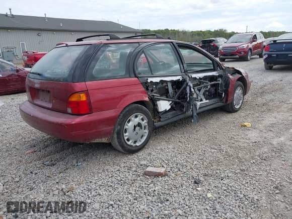 1996 Saturn SW z VIN 1G8ZJ8272TZ346249, wystawiony jako IAAI lot #43384611 z przebiegiem 182 853 mil mil oraz . Historia ofert i sprzedaży dostępna na DreamBid. Obrazek 4.