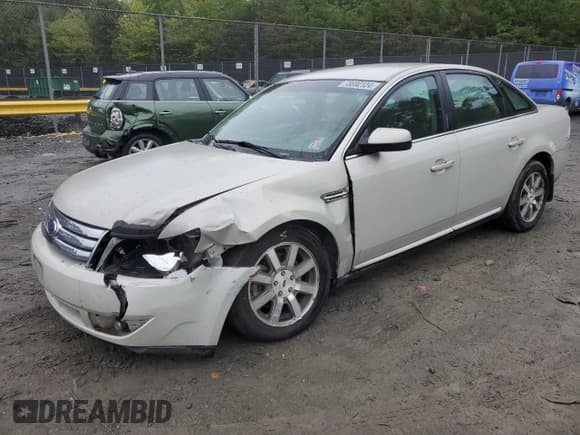 ✅ 2008 Ford Taurus SEL • VIN: 1FAHP24W78G154447 • Лот: 73690124. Опубликован ранее на Copart с пробегом 175 261 миль. Бесплатный доступ к архиву аукционных продаж из США и подробный отчёт об истории автомобиля на DreamBid. Изображение 1.