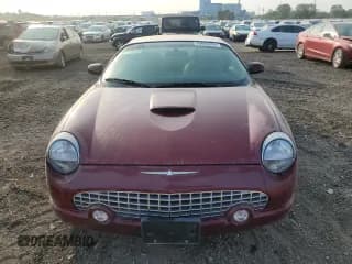 ✅ 2004 Ford Thunderbird Deluxe • VIN: 1FAHP60A44Y104370 • Lot: 70694284. Wystawiony na Copart z przebiegiem Nie podano. Bezpłatny archiwum sprzedaży aukcyjnych z USA i szczegółowy raport historii pojazdu na DreamBid. Zdjęcie 5.