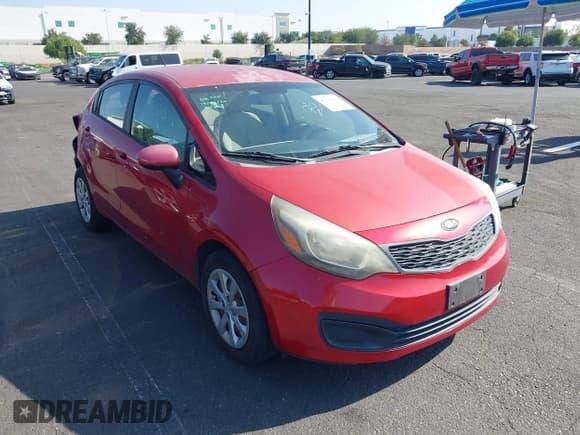 ✅ 2013 Kia Rio LX • VIN: KNADM4A35D6234401 • Lot: 43626565. Listed on IAAI with 96,392 mi. Free auction sales archive from the USA and detailed vehicle history report at DreamBid. Image 1.