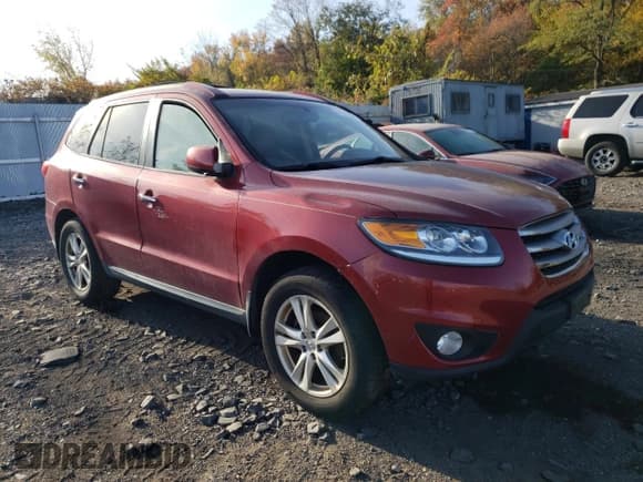 ✅ 2012 Hyundai Santa Fe Limited • VIN: 5XYZKDAG1CG104807 • Lot: 78023404. Listed on Copart with 128,841 mi. Free auction sales archive from the USA and detailed vehicle history report at DreamBid. Image 4.