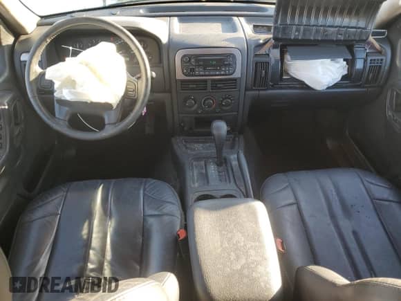 2004 Jeep Grand Cherokee Laredo с VIN 1J4GX48S54C385240, выставлен на аукционе Copart как лот 86716575 с пробегом 131 190 миль миль и Списание • Salvage title. История ставок и продаж доступна на DreamBid. Изображение 8.