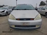 ✅ 2000 Ford Focus ZX3 • VIN: 3FAFP3134YR220498 • Lot: 94833625. Listed on Copart with 183,991 mi. Free auction sales archive from the USA and detailed vehicle history report at DreamBid. Image 5.