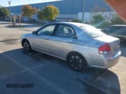 ✅ 2008 Kia Spectra EX • VIN: KNAFE121885556317 • Lot: 43887174. Listed on IAAI with 163,165 mi. Free auction sales archive from the USA and detailed vehicle history report at DreamBid. Image 3.