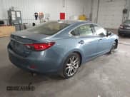 ✅ 2014 Mazda 6 i Grand Touring • VIN: JM1GJ1W67E1159404 • Lot: 42702402. Listed on IAAI with 107,039 mi. Free auction sales archive from the USA and detailed vehicle history report at DreamBid. Image 4.