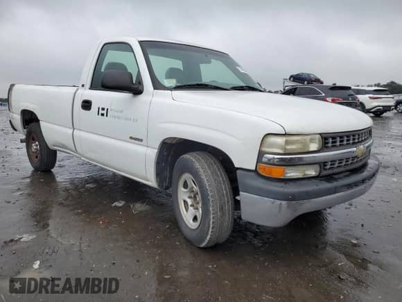 2002 Chevrolet Silverado 1500 z VIN 1GCEC14W12Z185739, wystawiony jako Copart lot #71419234 z przebiegiem 131 034 mil mil oraz Czysty tytuł • Clean title. Historia ofert i sprzedaży dostępna na DreamBid. Obrazek 4.
