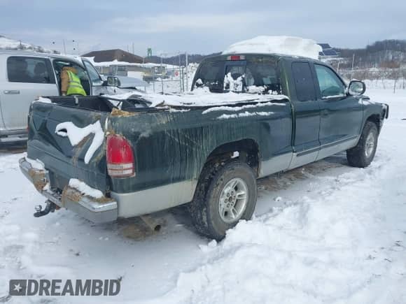 1997 Dodge Dakota with VIN 1B7GG23X5VS121326, listed as a IAAI auction lot 41341453 with 183,514 mi miles and . Bid and sale history available at DreamBid. Image 4.