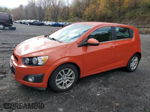 2013 Chevrolet Sonic LT with VIN 1G1JC6SG9D4206143, listed as a Copart auction lot 90741795 with 67,842 mi miles and Clean title. Bid and sale history available at DreamBid. Image 1.