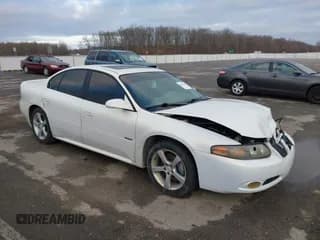 ✅ 2005 Pontiac Bonneville GXP • VIN: 1G2HZ54YX5U182591 • Lot: 41207843. Wystawiony na IAAI z przebiegiem 228 155 mil. Bezpłatny archiwum sprzedaży aukcyjnych z USA i szczegółowy raport historii pojazdu na DreamBid. Zdjęcie 1.