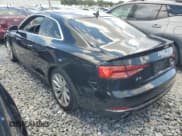 ✅ 2018 Audi A5 Premium • VIN: WAUNNAF54JA009177 • Лот: 67036555. Опубликован ранее на Copart с пробегом 145 750 миль. Бесплатный доступ к архиву аукционных продаж из США и подробный отчёт об истории автомобиля на DreamBid. Изображение 2.