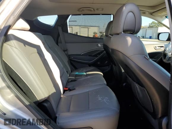 ✅ 2018 Hyundai Santa Fe 2.4L • VIN: 5NMZU3LB2JH103562 • Лот: 69069492. Опубликован ранее на Copart с пробегом 63 489 миль. Бесплатный доступ к архиву аукционных продаж из США и подробный отчёт об истории автомобиля на DreamBid. Изображение 11.