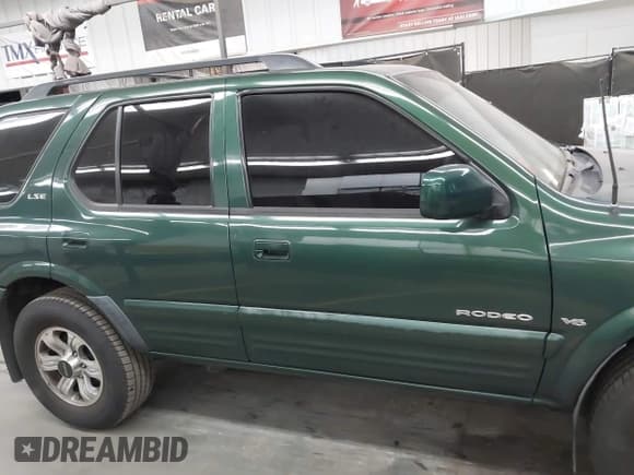 ✅ 2000 Isuzu Rodeo S • VIN: 4S2CK58W5Y4327631 • Lot: 42809277. Listed on IAAI with 194,394 mi. Free auction sales archive from the USA and detailed vehicle history report at DreamBid. Image 13.
