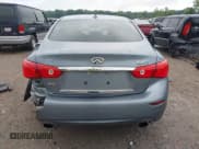 ✅ 2014 Infiniti Q50 Hybrid Premium • VIN: JN1AV7AR7EM700323 • Lot: 42862950. Listed on IAAI with 103,145 mi. Free auction sales archive from the USA and detailed vehicle history report at DreamBid. Image 17.