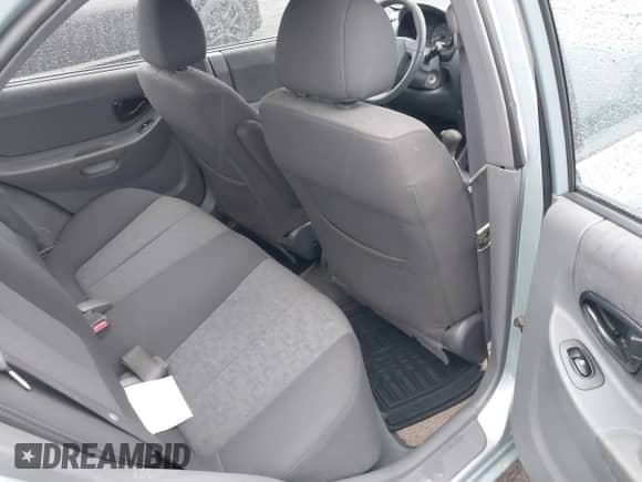 2003 Hyundai Accent GL z VIN KMHCG45C33U473080, wystawiony jako IAAI lot #41868765 z przebiegiem 57 478 mil mil oraz . Historia ofert i sprzedaży dostępna na DreamBid. Obrazek 8.