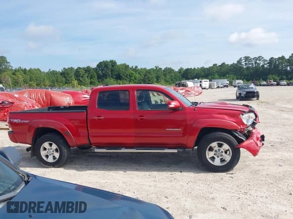 ✅ 2015 Toyota Tacoma PreRunner • VIN: 5TFKU4HN5FX006820 • Lot: 42647115. Listed on IAAI with 197,681 mi. Free auction sales archive from the USA and detailed vehicle history report at DreamBid. Image 13.