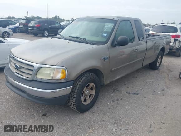 ✅ 2003 Ford F-150 XL • VIN: 1FTRX17L63NA81893 • Lot: 43851752. Listed on IAAI with 323,591 mi. Free auction sales archive from the USA and detailed vehicle history report at DreamBid. Image 2.