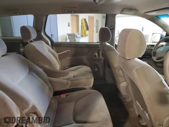 2005 Toyota Sienna LE z VIN 5TDZA23C45S348443, wystawiony jako Copart lot #90807535 z przebiegiem 200 755 mil mil oraz Szkoda całkowita • Salvage title. Historia ofert i sprzedaży dostępna na DreamBid. Obrazek 11.