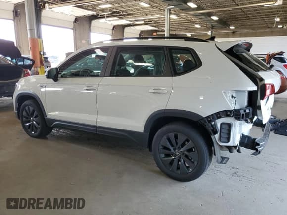 ✅ 2022 Volkswagen Taos S • VIN: 3VVAX7B22NM021428 • Лот: 68284935. Опубликован ранее на Copart с пробегом 65 332 миль. Бесплатный доступ к архиву аукционных продаж из США и подробный отчёт об истории автомобиля на DreamBid. Изображение 2.