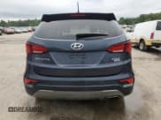 ✅ 2018 Hyundai Santa Fe 2.4L • VIN: 5NMZTDLB5JH072641 • Лот: 65176093. Опубликован ранее на Copart с пробегом Не указан. Бесплатный доступ к архиву аукционных продаж из США и подробный отчёт об истории автомобиля на DreamBid. Изображение 6.