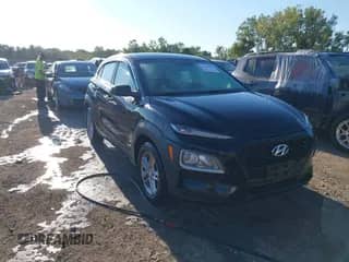 2018 Hyundai Kona SE z VIN KM8K12AA8JU088908, wystawiony jako IAAI lot #43112539 z przebiegiem 95 578 mil mil oraz . Historia ofert i sprzedaży dostępna na DreamBid. Obrazek 1.