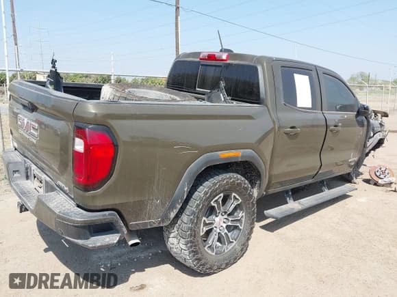 ✅ 2023 GMC Canyon 4WD AT4 • VIN: 1GTP6DEK5P1231432 • Lot: 41785102. Listed on IAAI with 33,154 mi. Free auction sales archive from the USA and detailed vehicle history report at DreamBid. Image 4.
