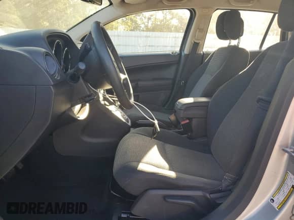 2011 Dodge Caliber Heat with VIN 1B3CB5HA1BD214462, listed as a Copart auction lot 75394274 with 176,495 mi miles and Salvage title. Bid and sale history available at DreamBid. Image 7.