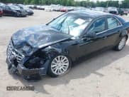 ✅ 2013 Cadillac CTS Luxury • VIN: 1G6DG5E50D0172049 • Lot: 42791826. Listed on IAAI with 65,718 mi. Free auction sales archive from the USA and detailed vehicle history report at DreamBid. Image 2.