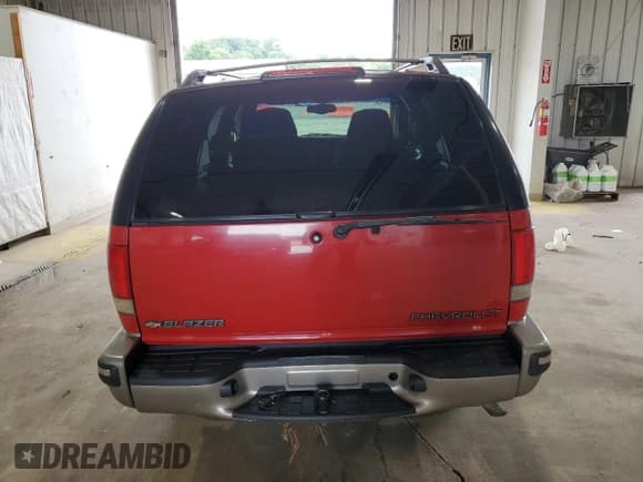 ✅ 1998 Chevrolet Blazer LS • VIN: 1GNDT13W7W2125774 • Lot: 63286745. Wystawiony na Copart z przebiegiem 142 305 mil. Bezpłatny archiwum sprzedaży aukcyjnych z USA i szczegółowy raport historii pojazdu na DreamBid. Zdjęcie 6.