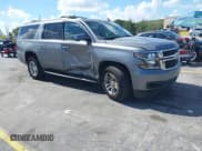 ✅ 2020 Chevrolet Suburban LT • VIN: 1GNSCHKC4LR302047 • Lot: 42518927. Listed on IAAI with 105,760 mi. Free auction sales archive from the USA and detailed vehicle history report at DreamBid. Image 1.