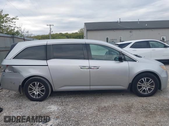 ✅ 2011 Honda Odyssey EX-L • VIN: 5FNRL5H64BB049775 • Lot: 43456710. Listed on IAAI with 183,653 mi. Free auction sales archive from the USA and detailed vehicle history report at DreamBid. Image 13.