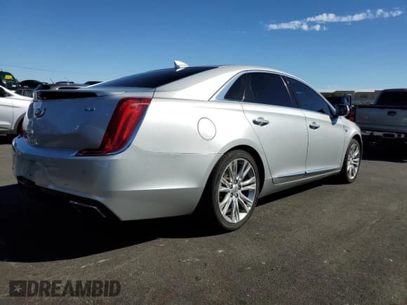 ✅ 2018 Cadillac XTS Luxury • VIN: 2G61M5S37J9147004 • Lot: 81266195. Wystawiony na Copart z przebiegiem 85 997 mil. Bezpłatny archiwum sprzedaży aukcyjnych z USA i szczegółowy raport historii pojazdu na DreamBid. Zdjęcie 3.