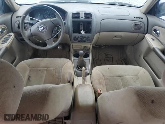 ✅ 2002 Mazda Protege DX • VIN: JM1BJ226821597592 • Lot: 72622424. Wystawiony na Copart z przebiegiem 148 842 mil. Bezpłatny archiwum sprzedaży aukcyjnych z USA i szczegółowy raport historii pojazdu na DreamBid. Zdjęcie 8.