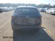 ✅ 2021 Mazda CX-5 Carbon Edition • VIN: JM3KFBCY7M0453842 • Лот: 84977175. Опубликован ранее на Copart с пробегом 50 274 миль. Бесплатный доступ к архиву аукционных продаж из США и подробный отчёт об истории автомобиля на DreamBid. Изображение 6.