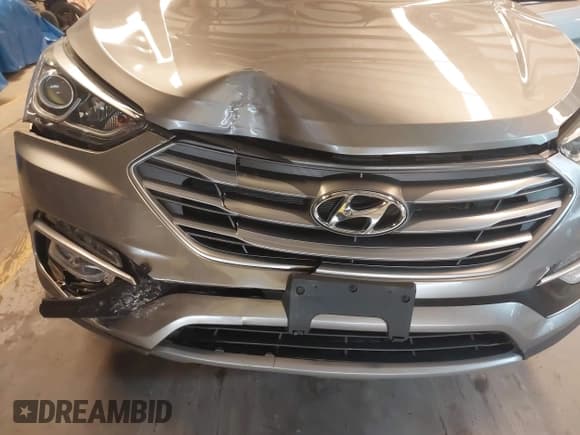 ✅ 2018 Hyundai Santa Fe 2.4L • VIN: 5NMZUDLB2JH072593 • Лот: 42846562. Опубликован ранее на IAAI с пробегом 56 789 миль. Бесплатный доступ к архиву аукционных продаж из США и подробный отчёт об истории автомобиля на DreamBid. Изображение 6.