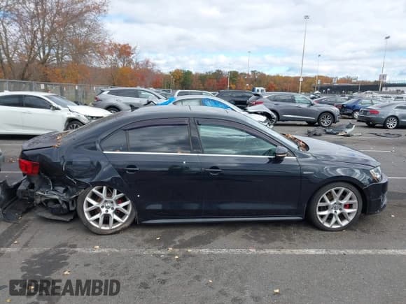 ✅ 2014 Volkswagen Jetta GLI • VIN: 3VW5T7AJ6EM258246 • Lot: 43543504. Listed on IAAI with 124,950 mi. Free auction sales archive from the USA and detailed vehicle history report at DreamBid. Image 13.