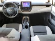 ✅ 2024 Toyota Corolla Hybrid LE • VIN: JTDBCMFE4R3067898 • Лот: 82598765. Опубликован ранее на Copart с пробегом 3 769 миль. Бесплатный доступ к архиву аукционных продаж из США и подробный отчёт об истории автомобиля на DreamBid. Изображение 8.