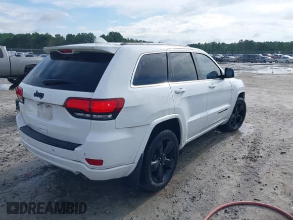 ✅ 2015 Jeep Grand Cherokee Laredo • VIN: 1C4RJEAG5FC901207 • Lot: 42972625. Listed on IAAI with 109,804 mi. Free auction sales archive from the USA and detailed vehicle history report at DreamBid. Image 4.