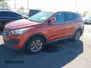 2015 Hyundai Santa Fe z VIN 5XYZTDLBXFG266793, wystawiony jako IAAI lot #43588575 z przebiegiem 129 838 mil mil oraz . Historia ofert i sprzedaży dostępna na DreamBid. Obrazek 17.