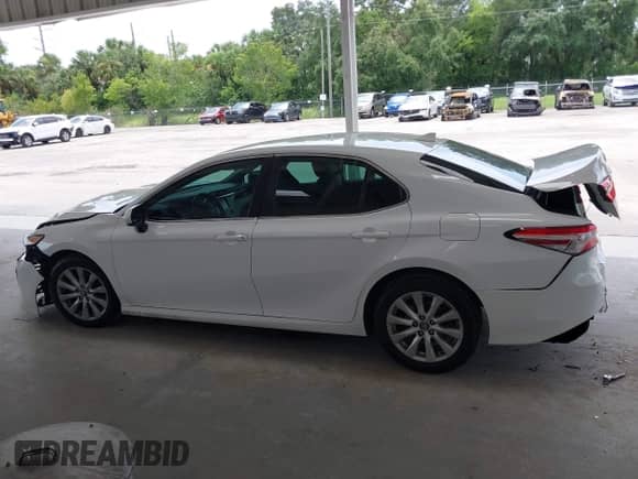 2019 Toyota Camry LE with VIN 4T1B11HK3KU709546, listed as a IAAI auction lot 42836396 with 113,611 mi miles and . Bid and sale history available at DreamBid. Image 14.
