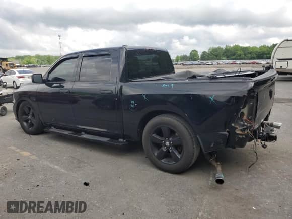 2014 Ram 1500 Tradesman with VIN 1C6RR7KT4ES267285, listed as a Copart auction lot 57248955 with 140,450 mi miles and Salvage title. Bid and sale history available at DreamBid. Image 2.